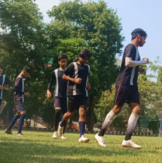 Energetic MBIS students actively participating in a thrilling football game.
